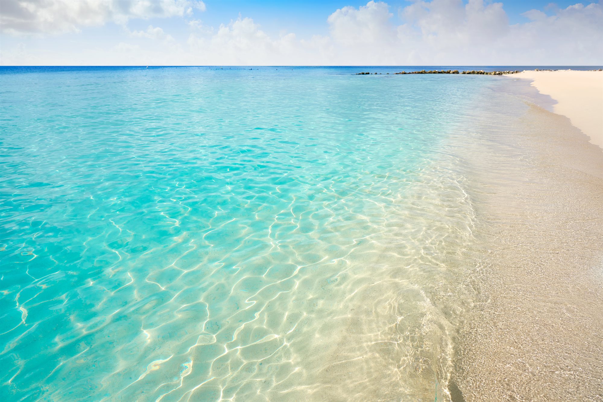 Palm-fringed beach on Mexico&rsquo;s Riviera Maya